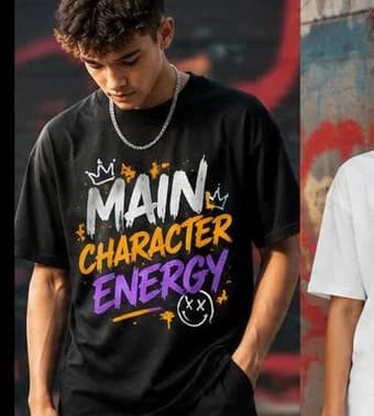Teenager wearing a black t-shirt printed with bold text reading Main Character Energy